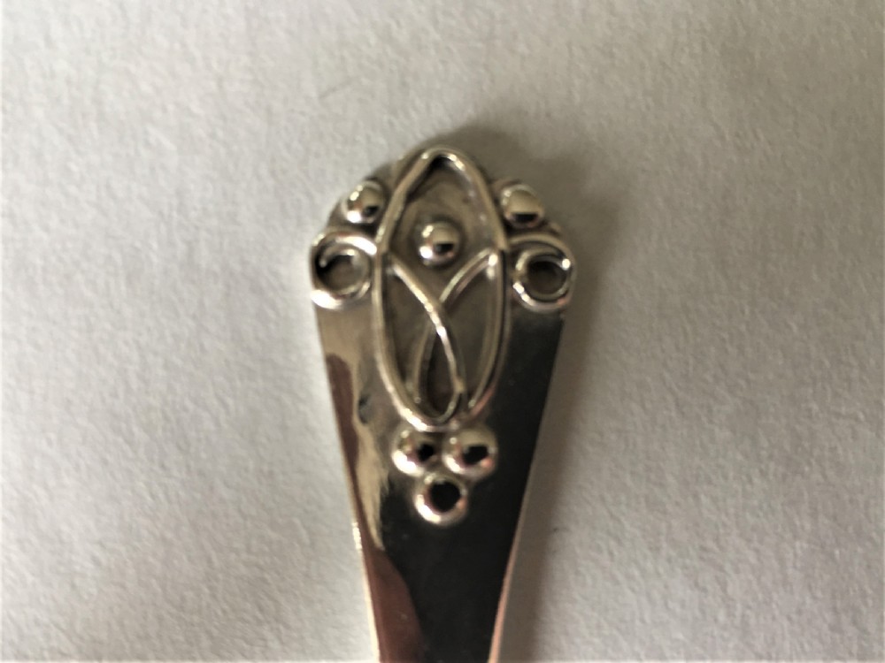 A Northwich Arts & Crafts silver sifter spoon View II