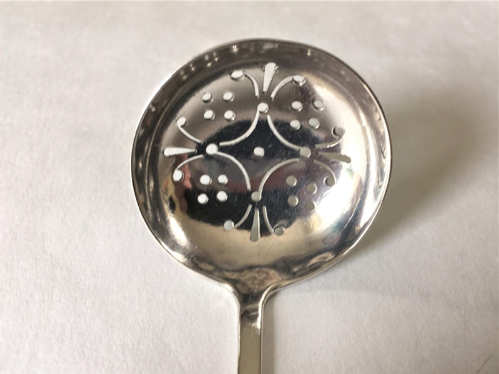 A Northwich Arts & Crafts silver sifter spoon View III