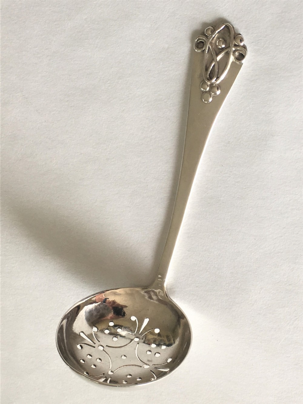 A Northwich Arts & Crafts silver sifter spoon View VI