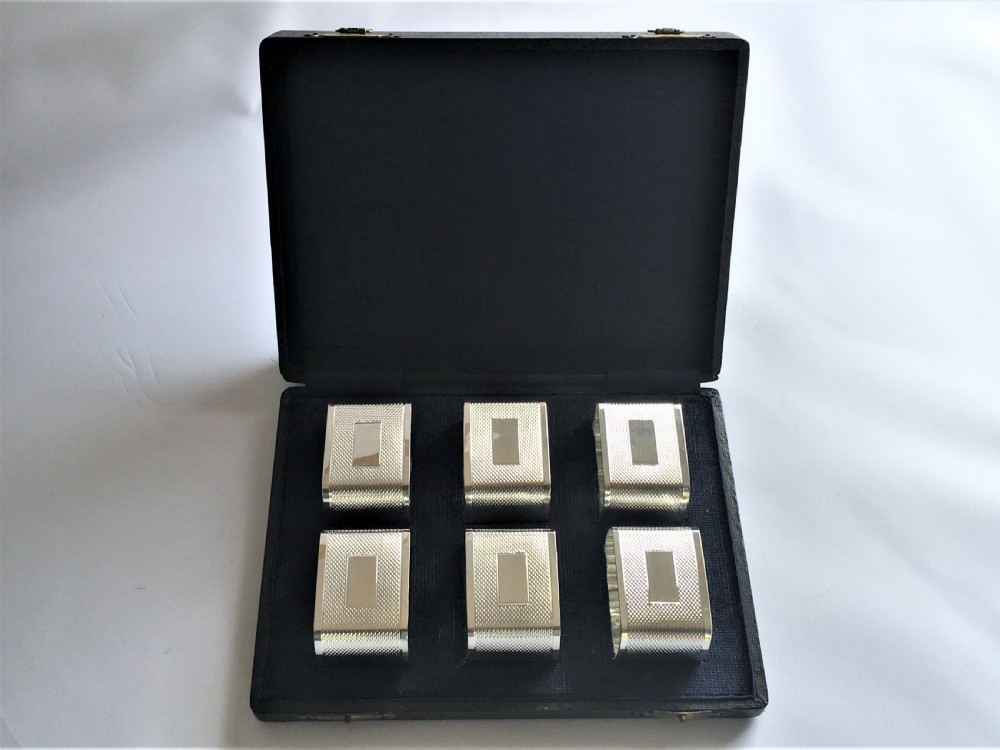 A superb set of six Art Deco silver napkin rings