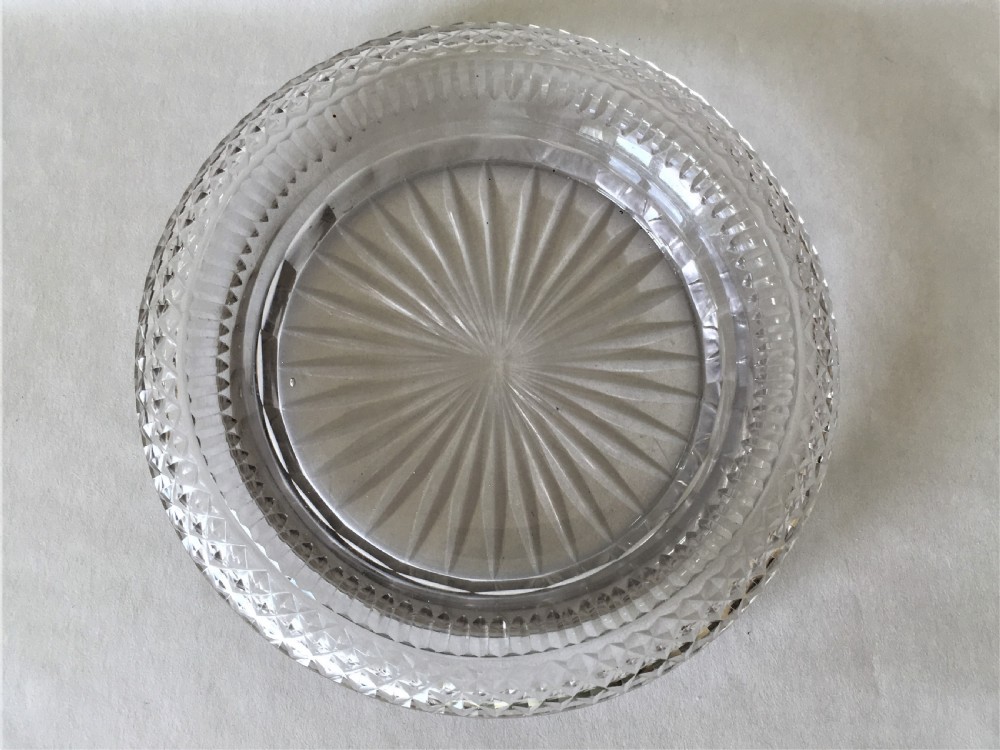 An extremely rare Regency cut glass decanter coaster View IV