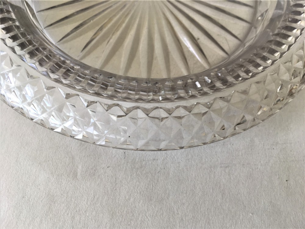 An extremely rare Regency cut glass decanter coaster View V