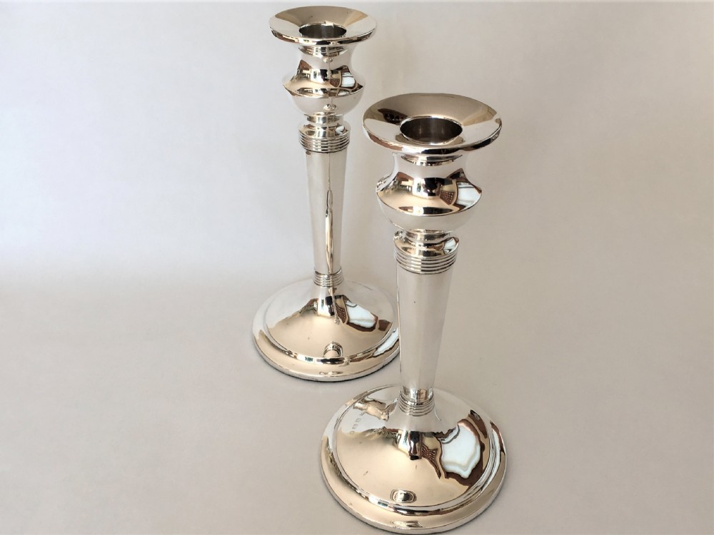 A handsome pair of Edwardian silver candlesticks View IV