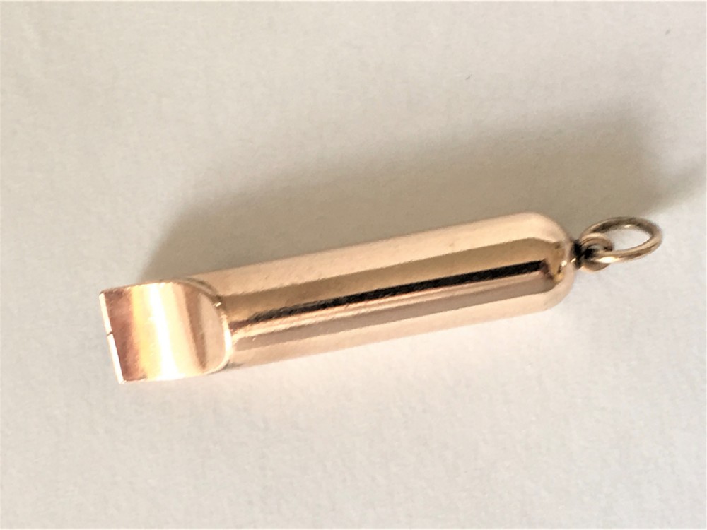 A rare Victorian 9ct. gold dog whistle View II