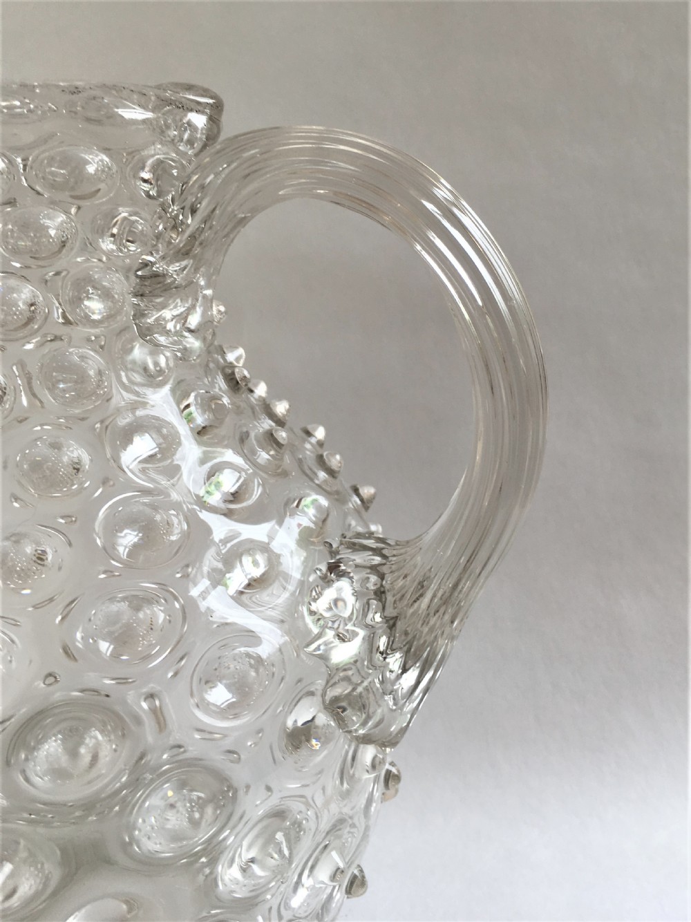 An impressive Victorian 'bobbled' glass water jug View V