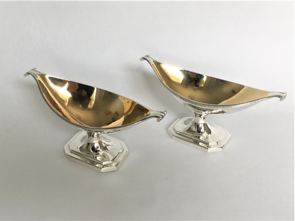 A gorgeous pair of Victorian silver gilt condiment boats