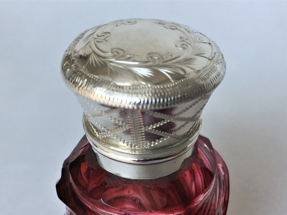 An unusual Victorian silver & cranberry scent bottle View IV