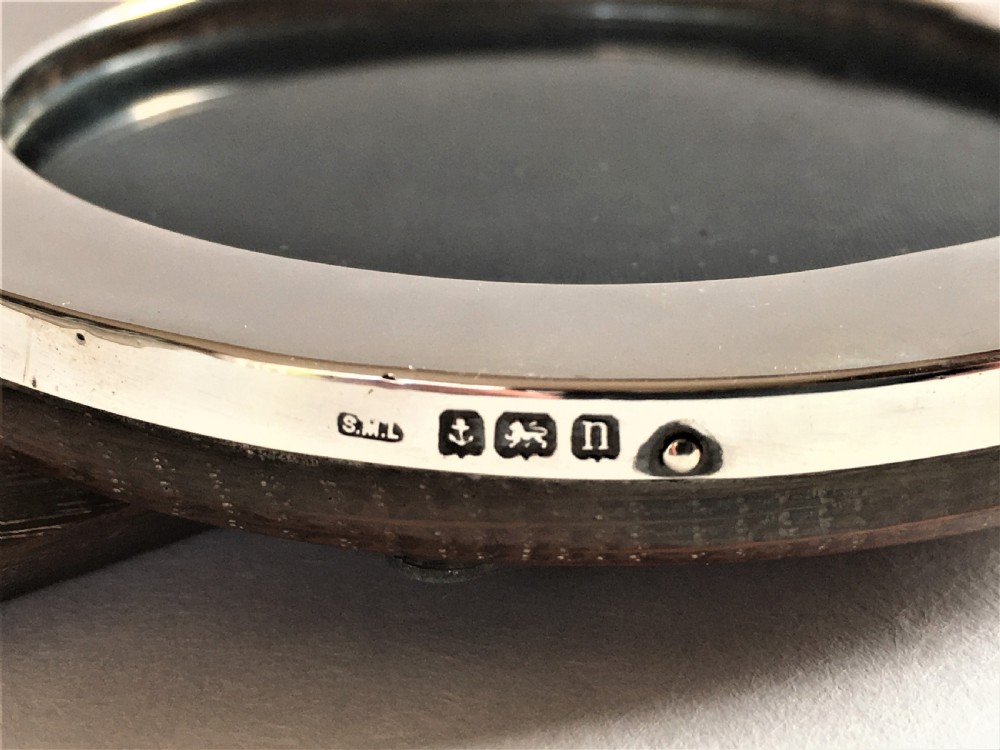 A lovely circular small silver photo frame View VI