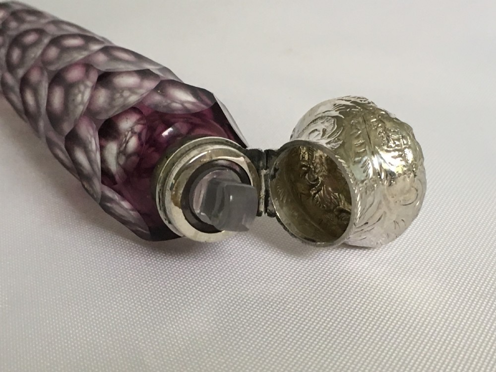 A superb Victorian silver mounted amethyst scent flask View V