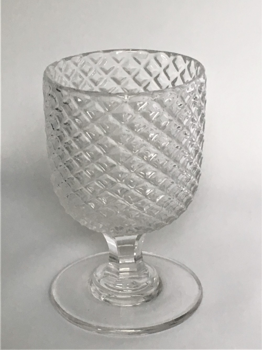 A handsome Victorian honeycomb moulded rummer