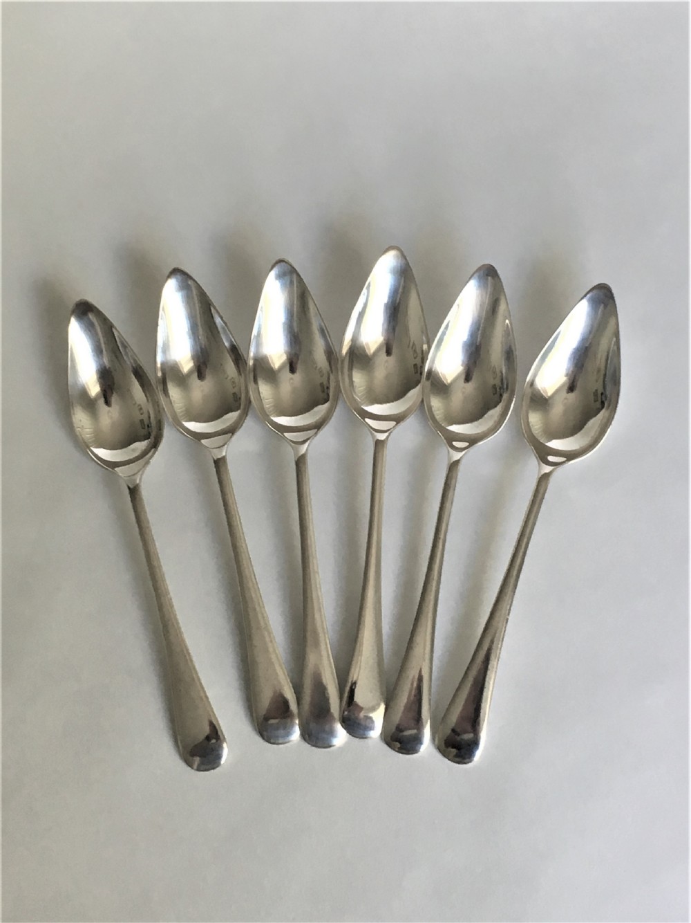 A rare set of six silver grapefruit spoons