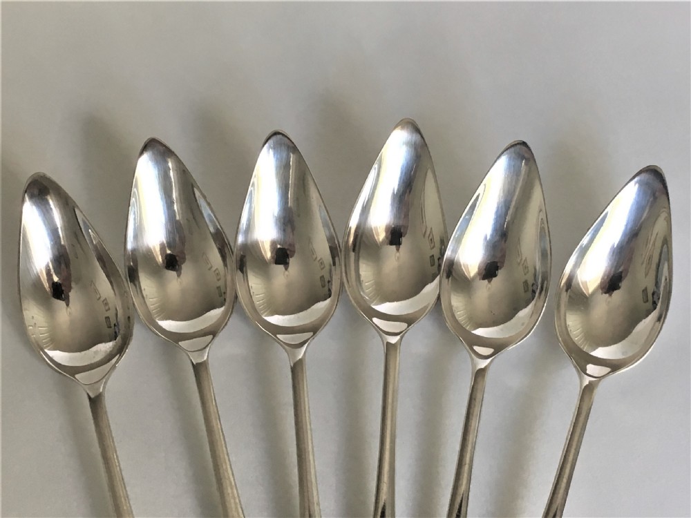 A rare set of six silver grapefruit spoons View III