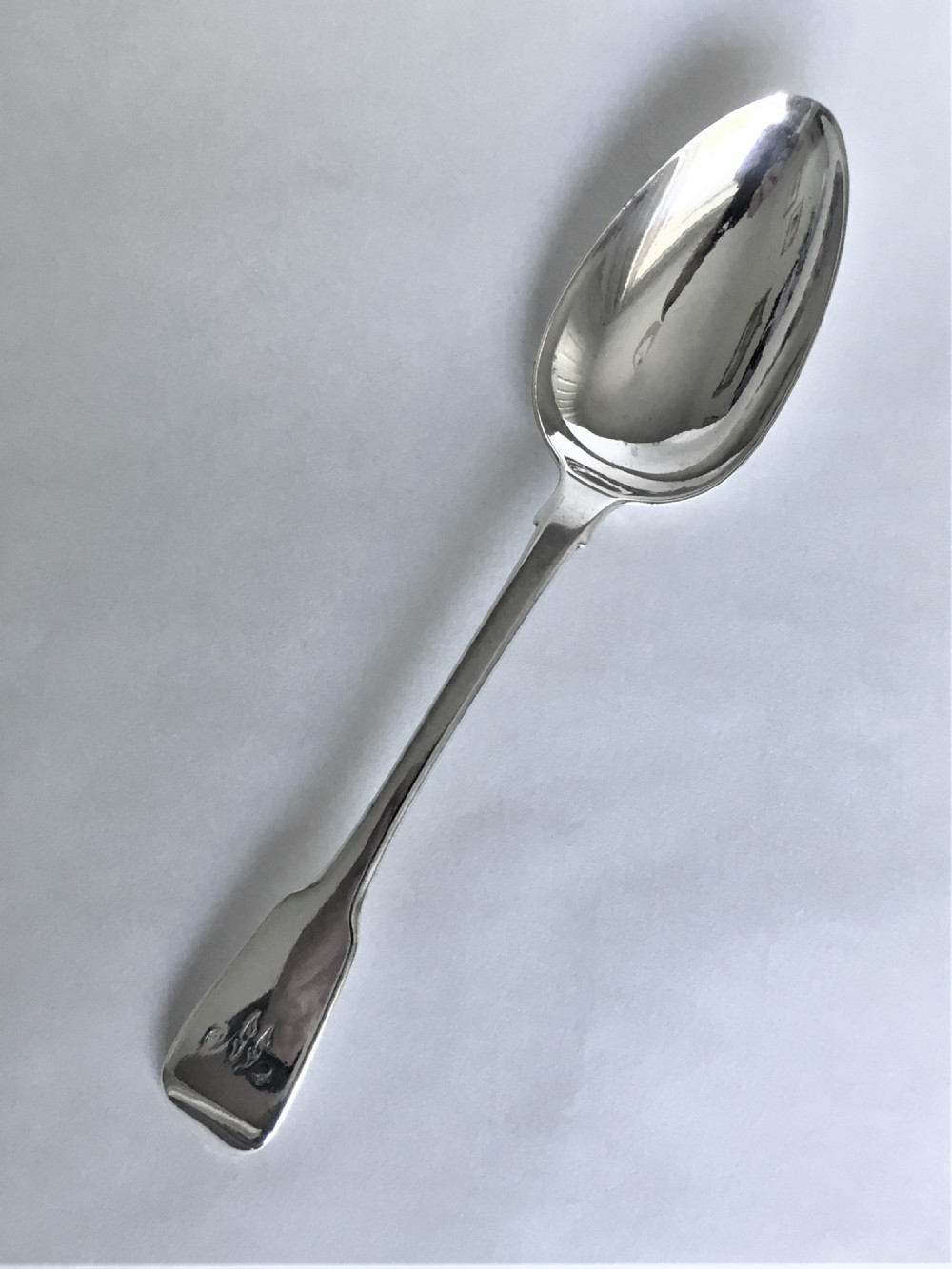A large Georgian silver serving/tablespoon