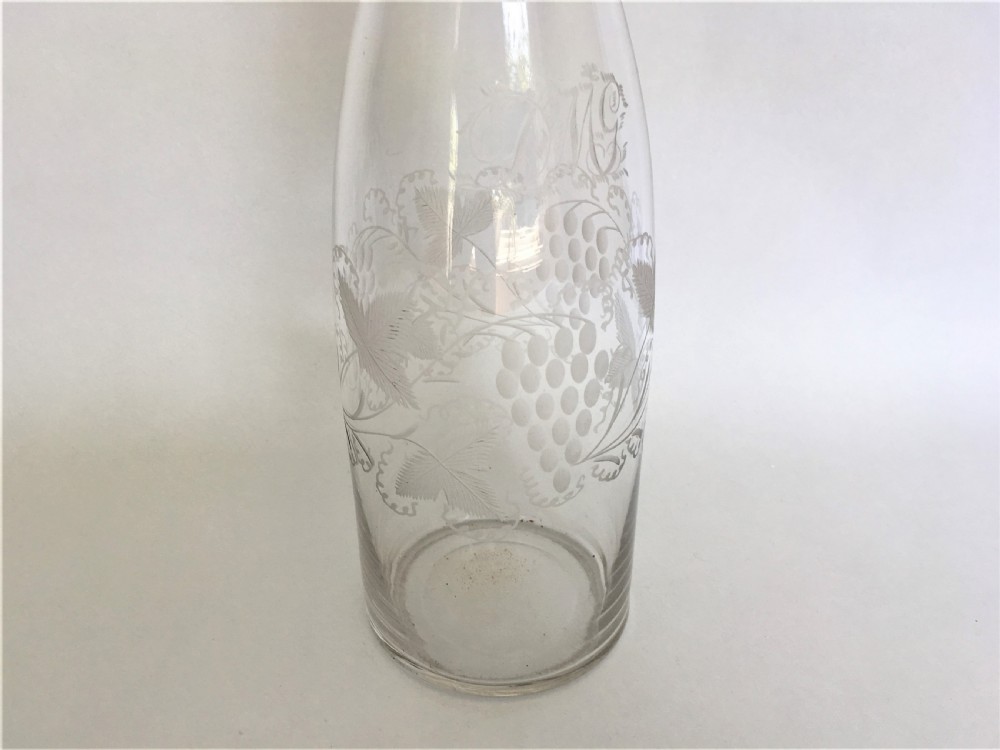 A Victorian etched wine bottle & silver stopper View III