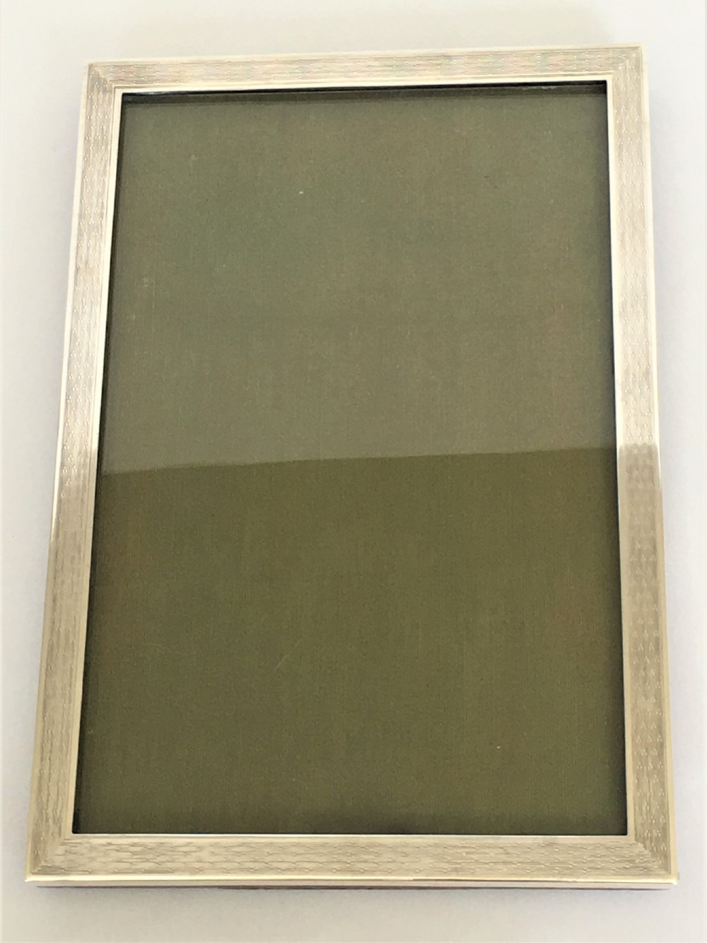 An Art Deco engine turned silver photo frame View V