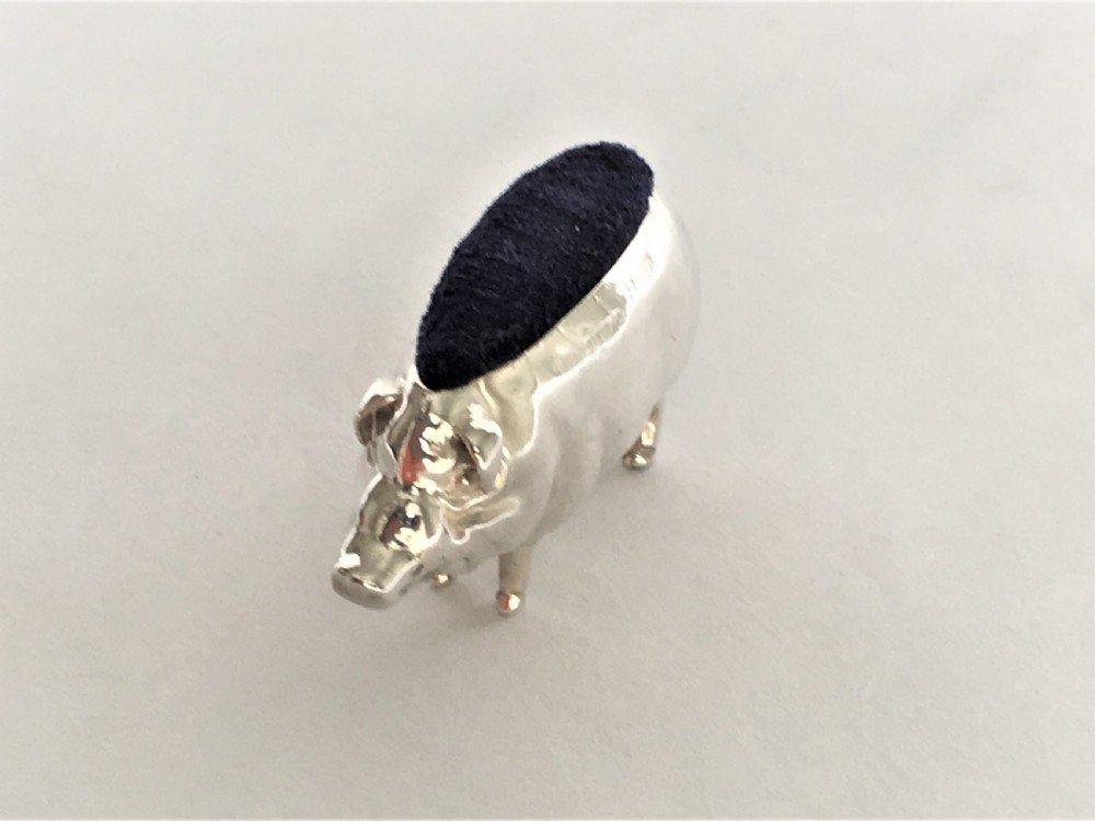 A wonderful Edwardian silver pig pin cushion View II