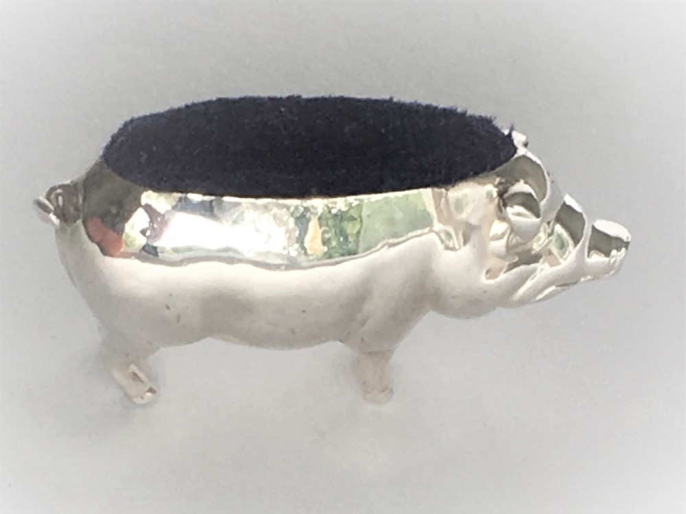 A wonderful Edwardian silver pig pin cushion View IV