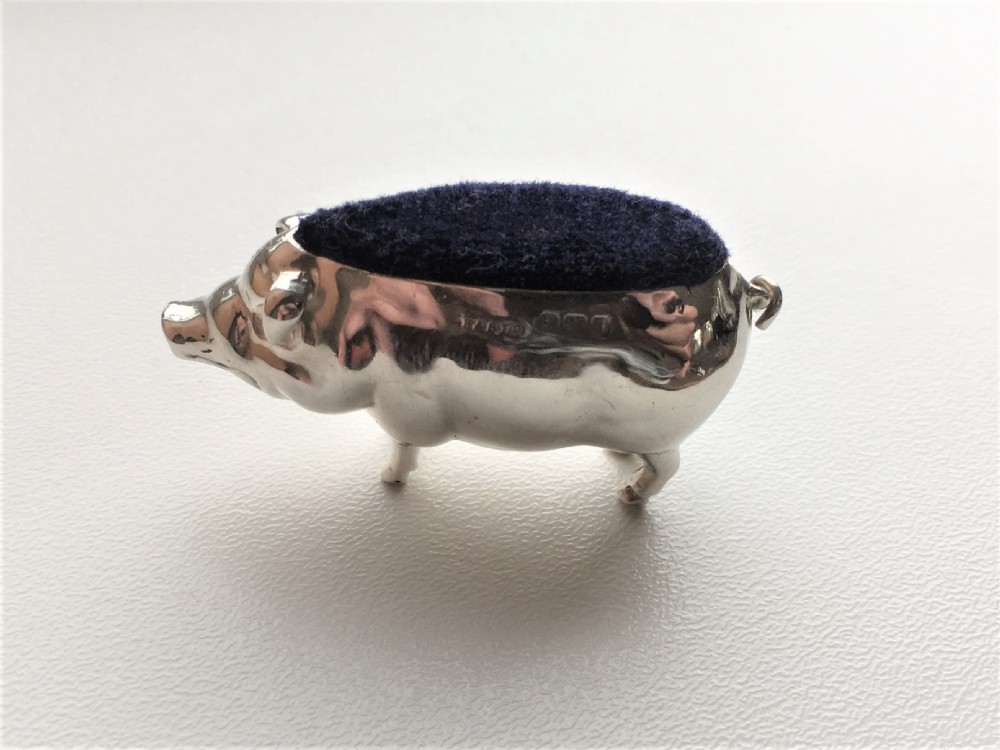 A wonderful Edwardian silver pig pin cushion View V