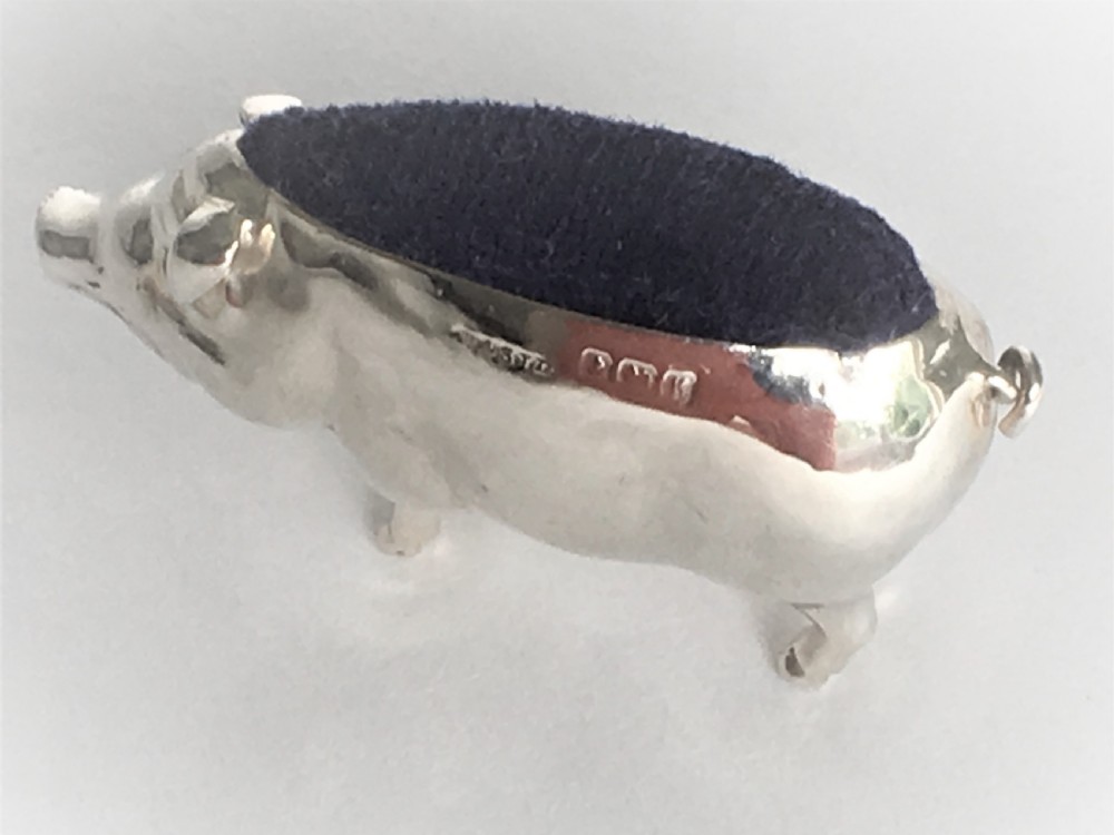 A wonderful Edwardian silver pig pin cushion View VI