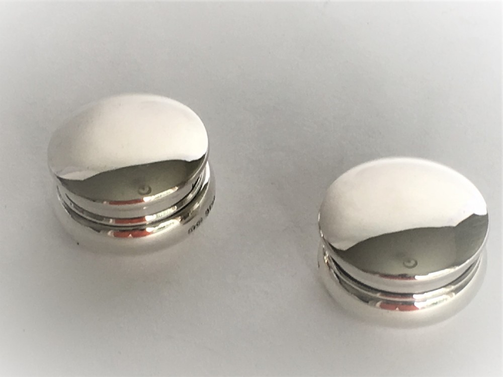 A pair of 'his & hers' silver pill boxes