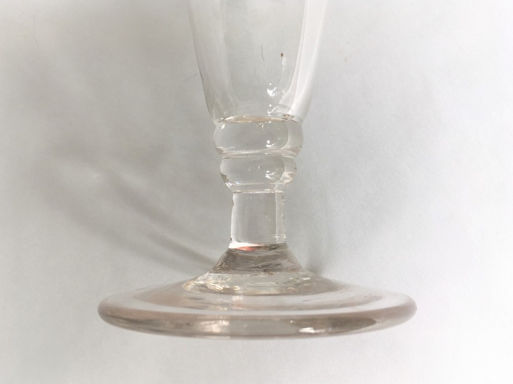 A rare 18th Century gin glass View V