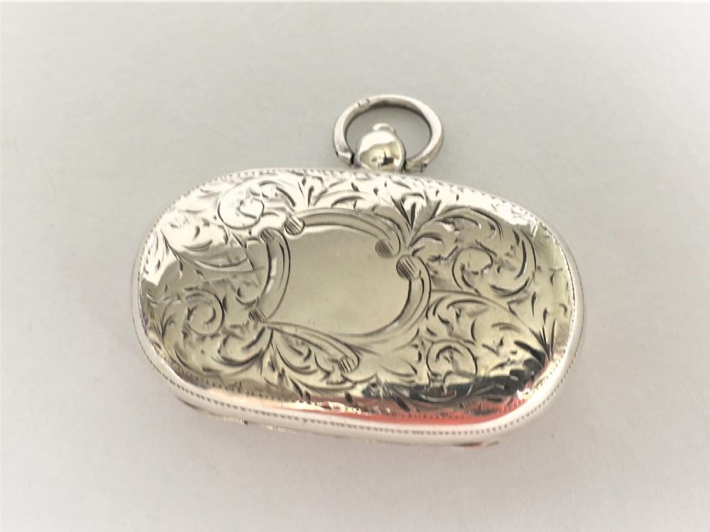 A late Victorian silver double sovereign case