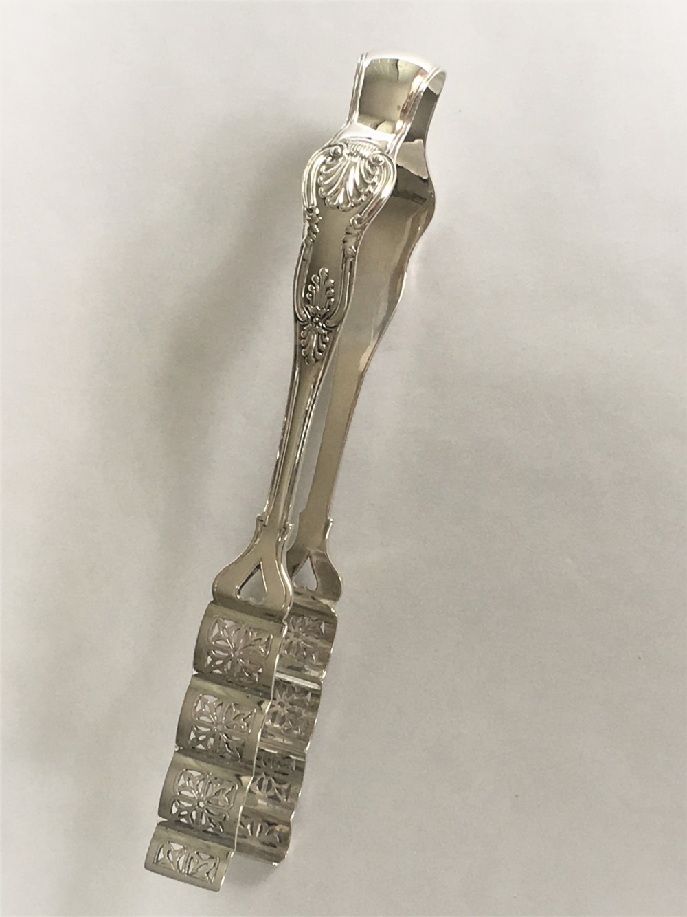 A fabulous pair of Victorian silver asparagus tongs View VI