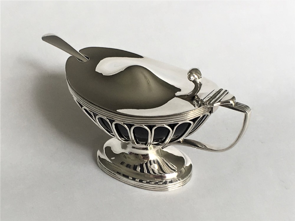 A fabulous silver wirework mustard pot & spoon View II