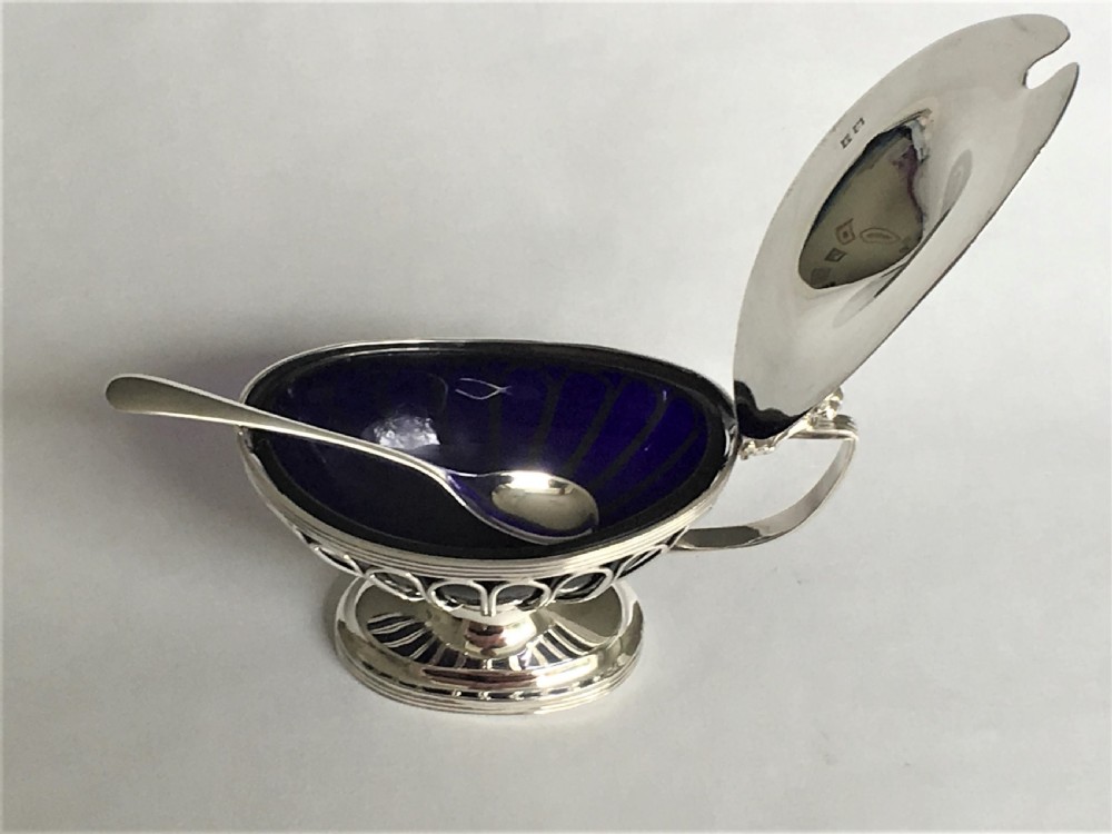 A fabulous silver wirework mustard pot & spoon View III