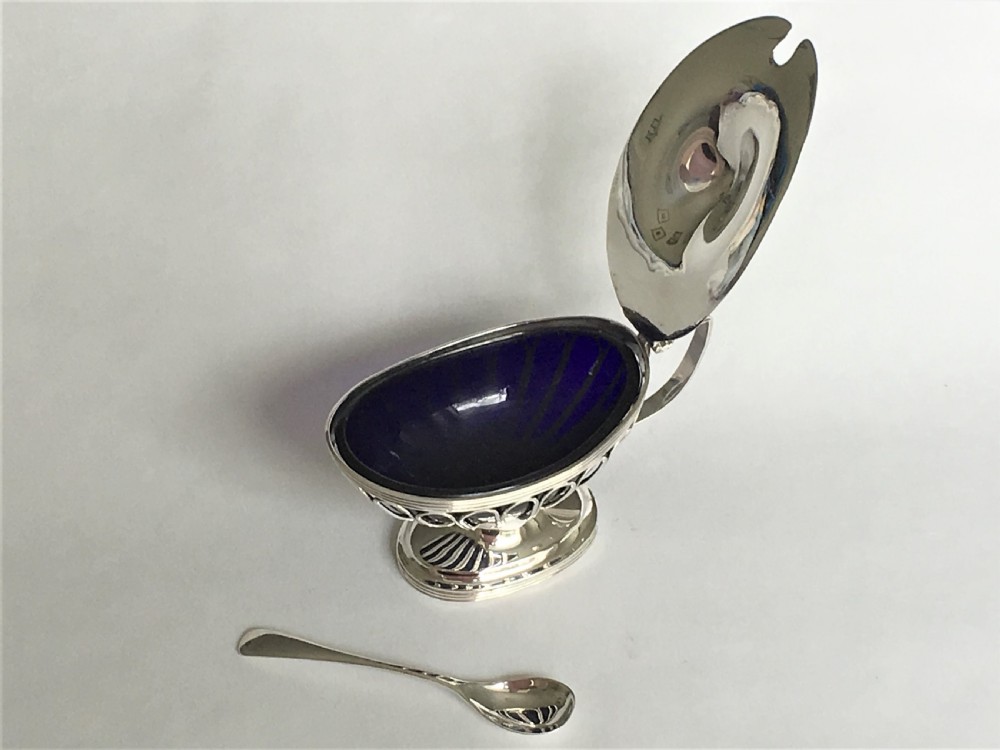 A fabulous silver wirework mustard pot & spoon View IV