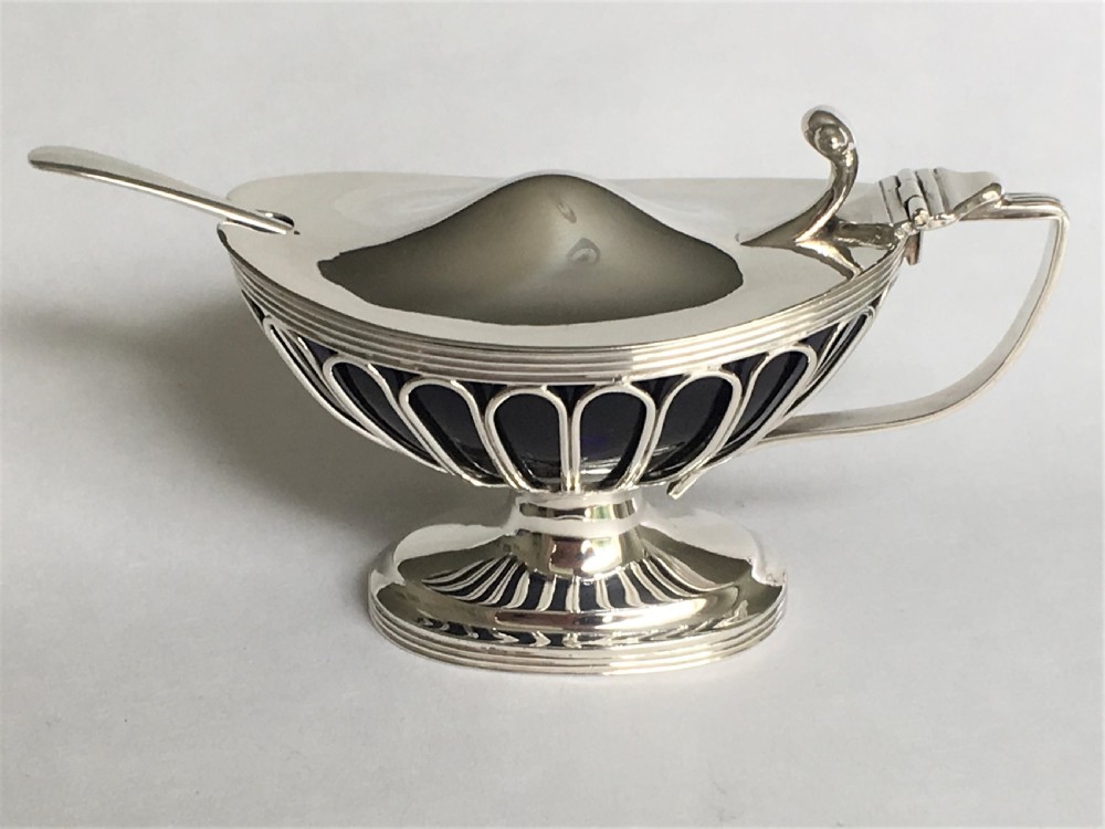 A fabulous silver wirework mustard pot & spoon View VI