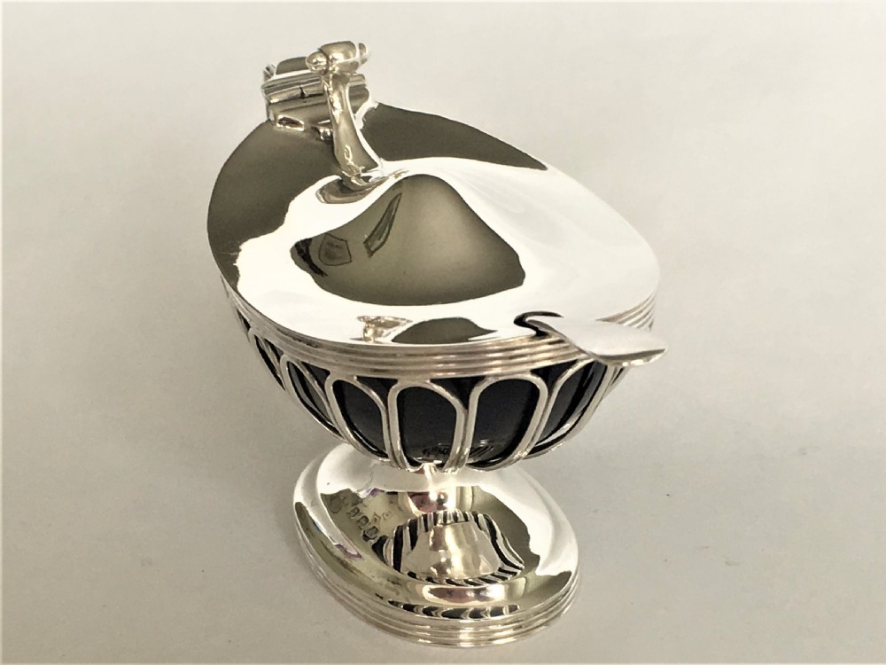 A fabulous silver wirework mustard pot & spoon View VIII