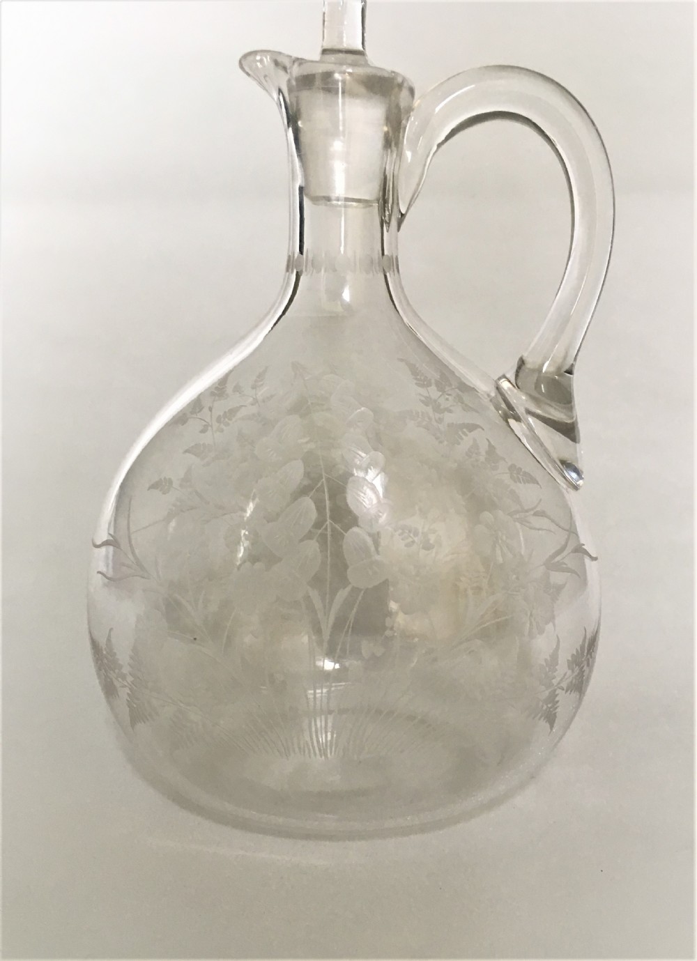 A Victorian flower and fern etched wine jug View II