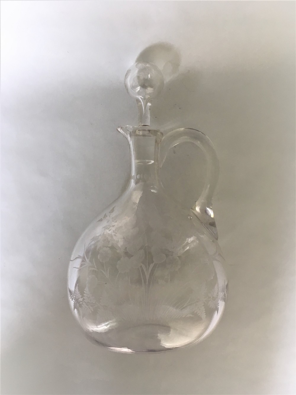 A Victorian flower and fern etched wine jug View V