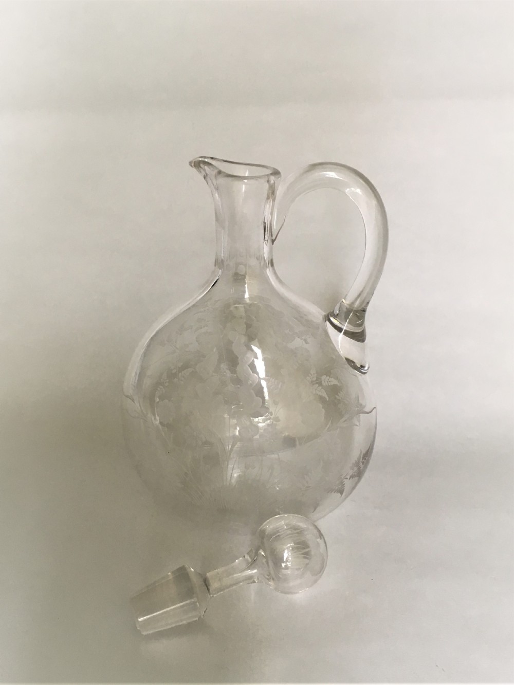 A Victorian flower and fern etched wine jug View VII
