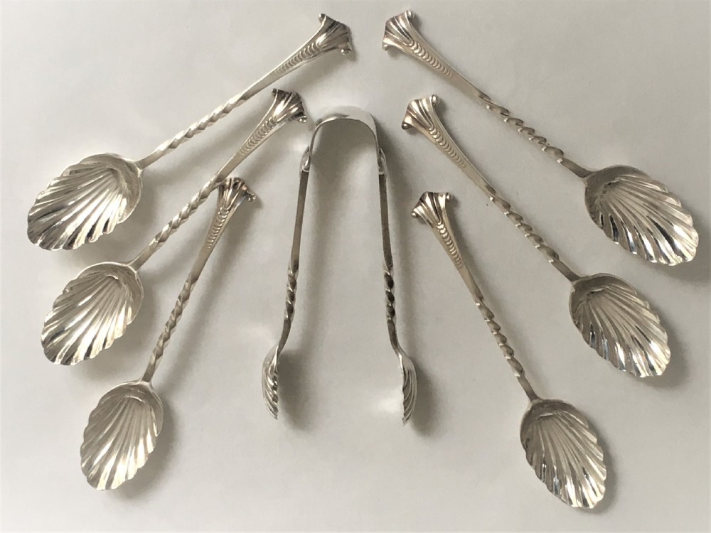 A wonderful set of 6 silver Onslow pattern teaspoons and tongs