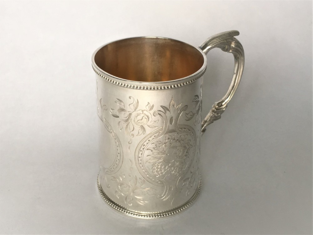 A fabulous Victorian silver gilt mug View II