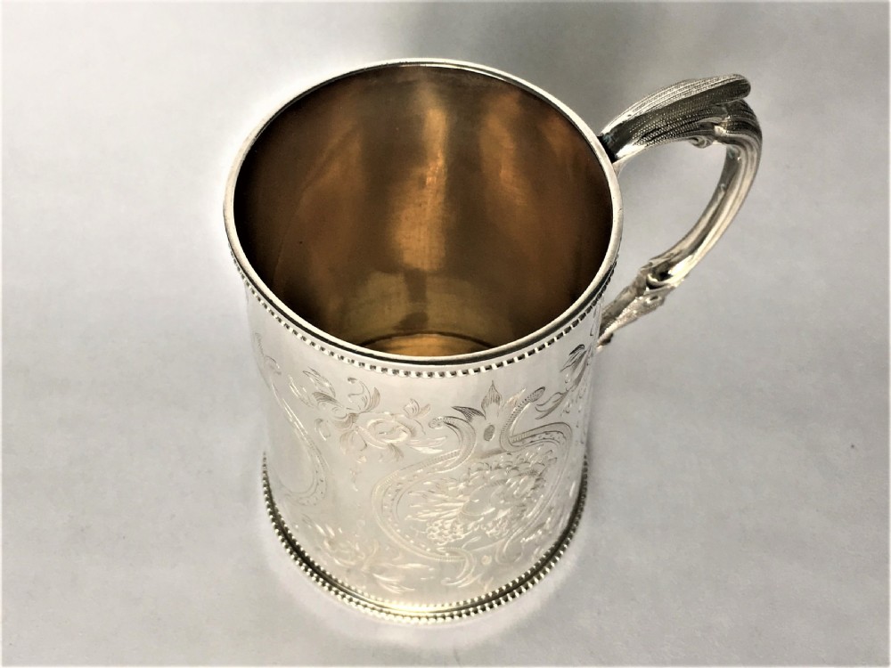 A fabulous Victorian silver gilt mug View III