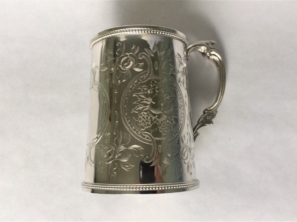 A fabulous Victorian silver gilt mug View IV