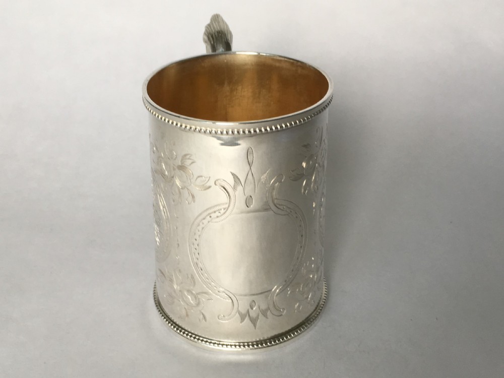 A fabulous Victorian silver gilt mug View V