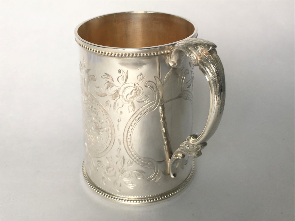 A fabulous Victorian silver gilt mug View VI