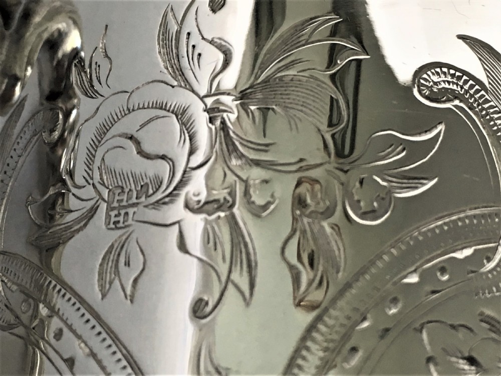 A fabulous Victorian silver gilt mug View VIII
