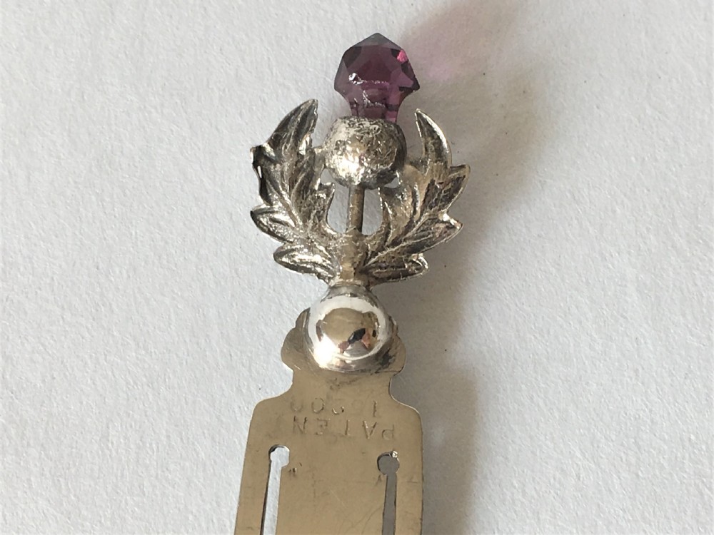 A delightful silver thistle bookmark View III