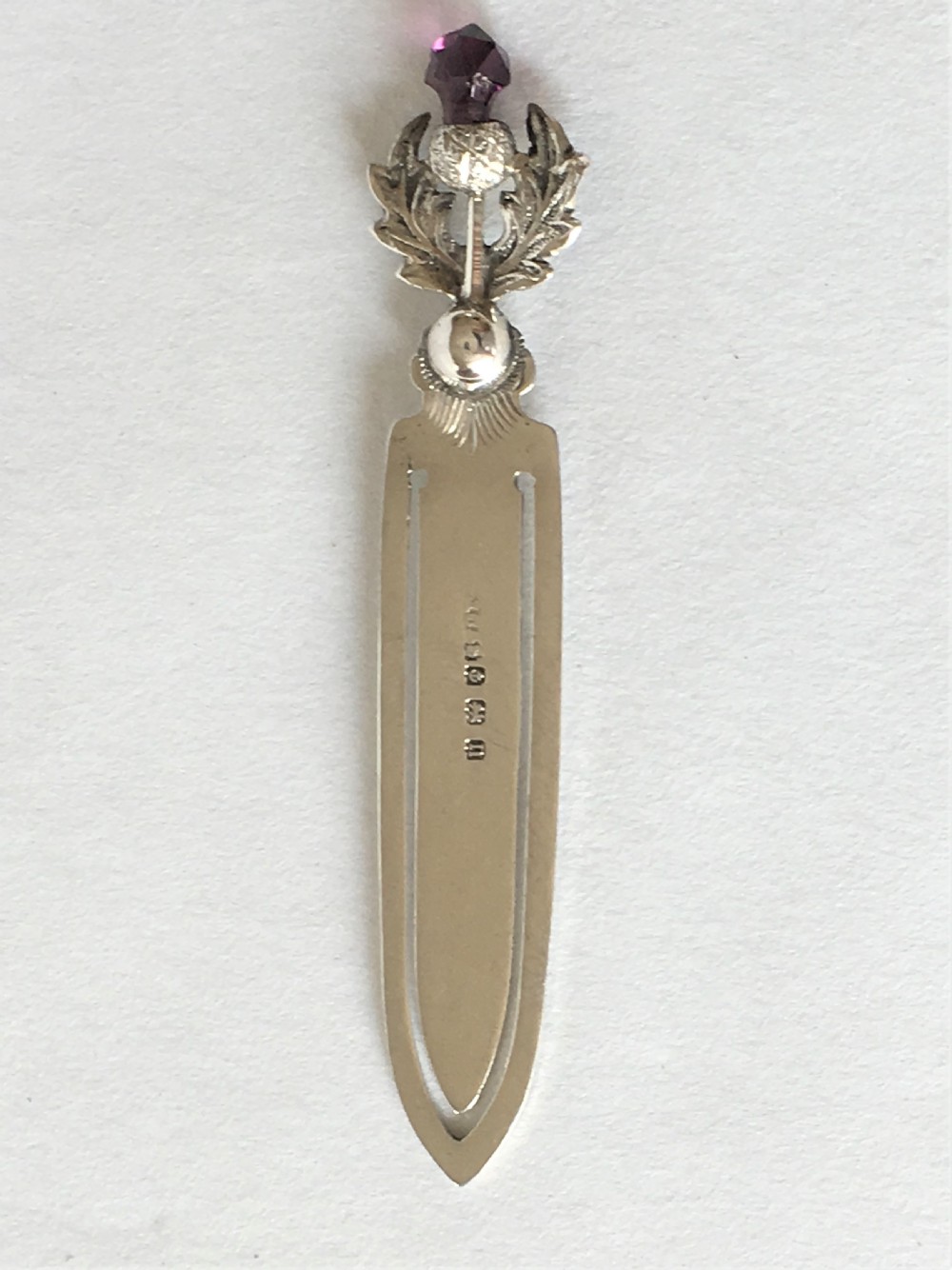 A delightful silver thistle bookmark View IV