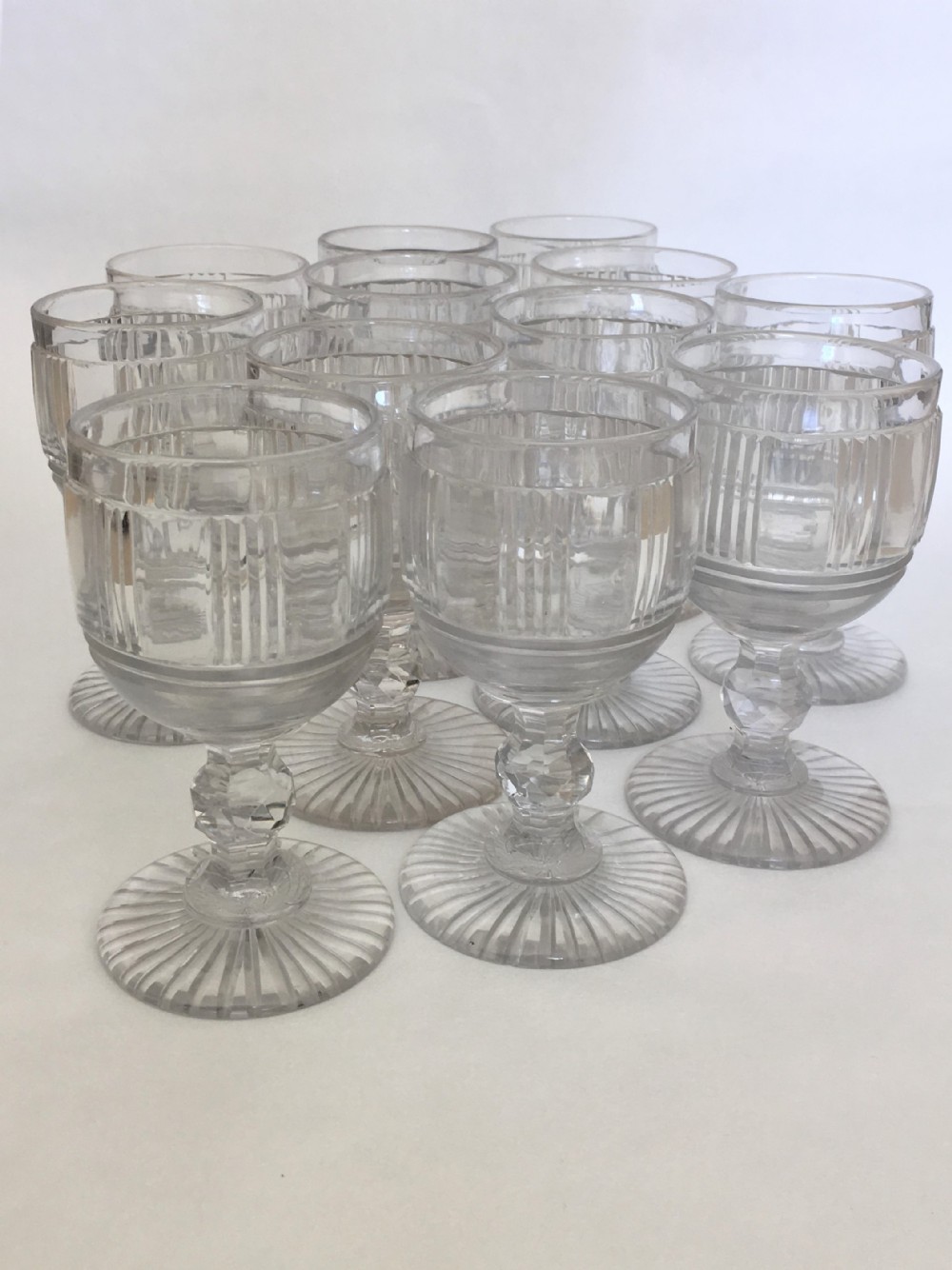 A superb suite of 12 cut glass Victorian wine goblets