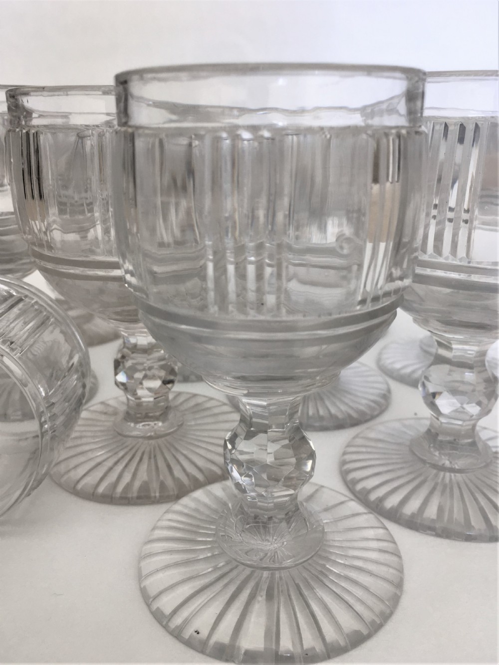 A superb suite of 12 cut glass Victorian wine goblets View XIII