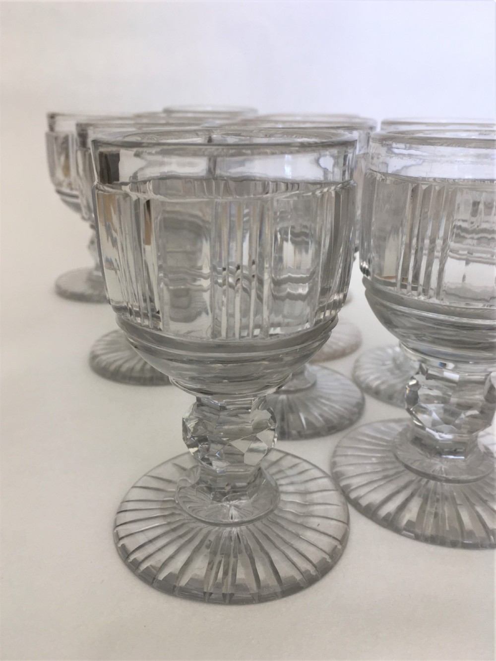 A handsome suite of 10 Victorian cut glass dessert wine glasses View III