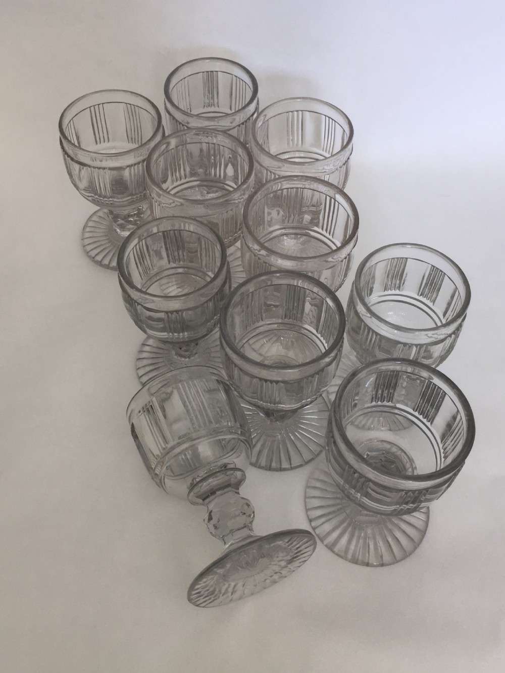 A handsome suite of 10 Victorian cut glass dessert wine glasses View VII