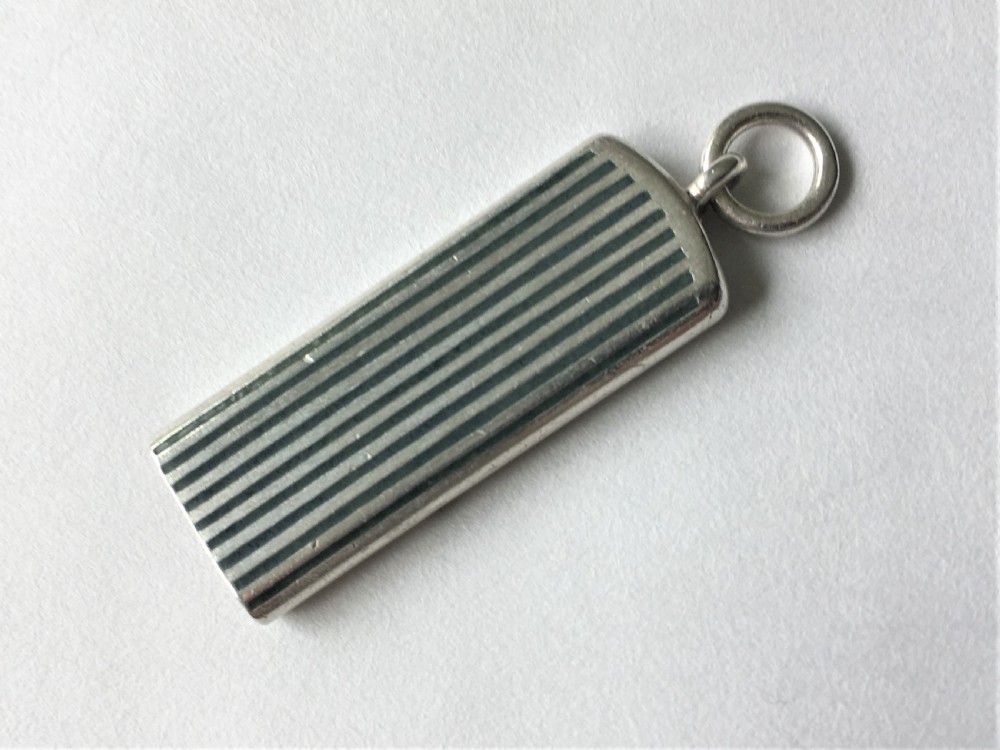 A rare silver and enamel whistle View III