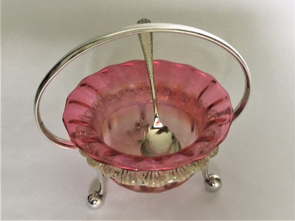 A Victorian Vaseline glass and silver plated preserve dish and spoon View IV